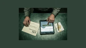 Navigating Economic Currents: Expert Strategies for Financial Resilience A person analyzing macroeconomic indicators like CPI and GDP on a steel table, highlighting current economic trends and their impact on personal finance.